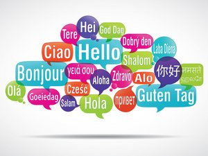 Das Bild zeigt die Worte "Guten Tag" in unterschiedlichen Sprachen als Wortwolke.